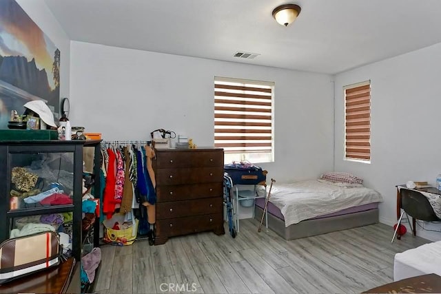 bedroom with light wood-type flooring