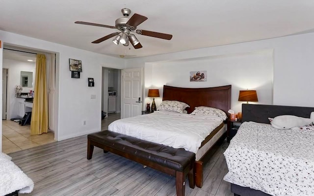 bedroom featuring hardwood / wood-style floors and ceiling fan