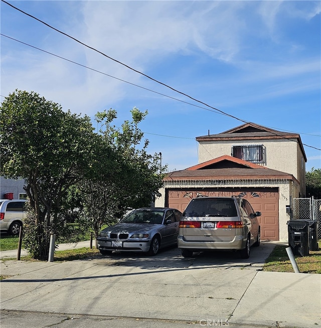 view of front of home with a garage