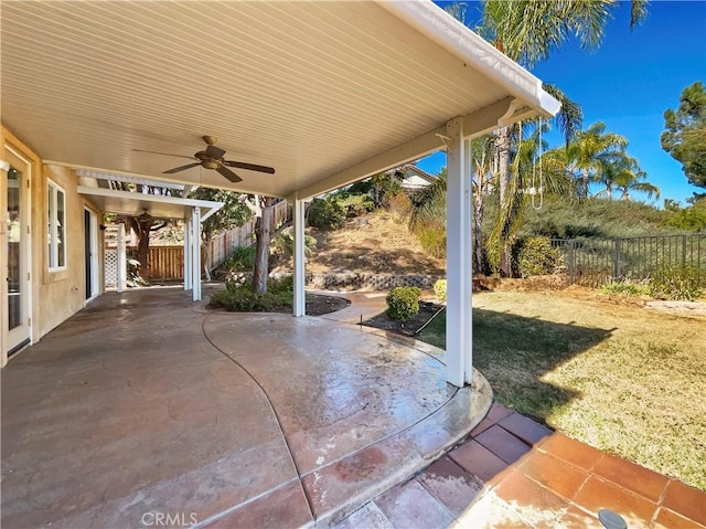 view of patio featuring ceiling fan