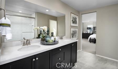 bathroom with vanity and walk in shower