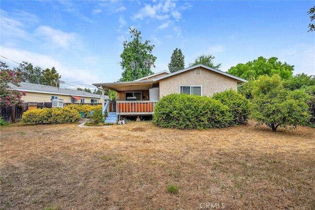 view of front of home with a front lawn