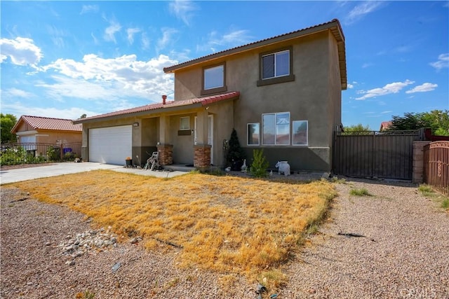 view of front of property with a garage