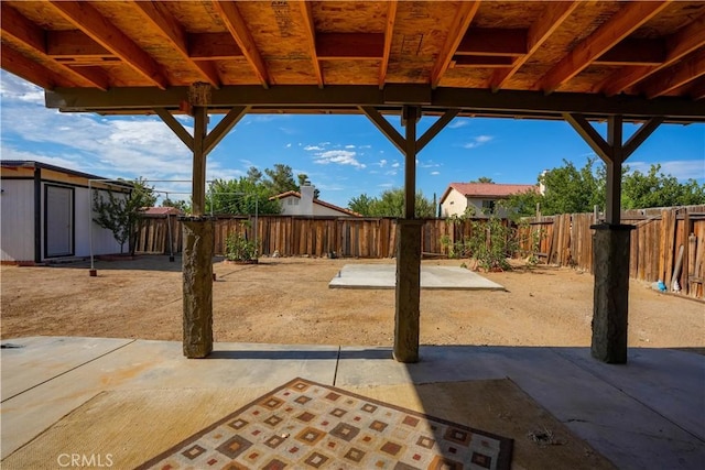 view of patio with a shed