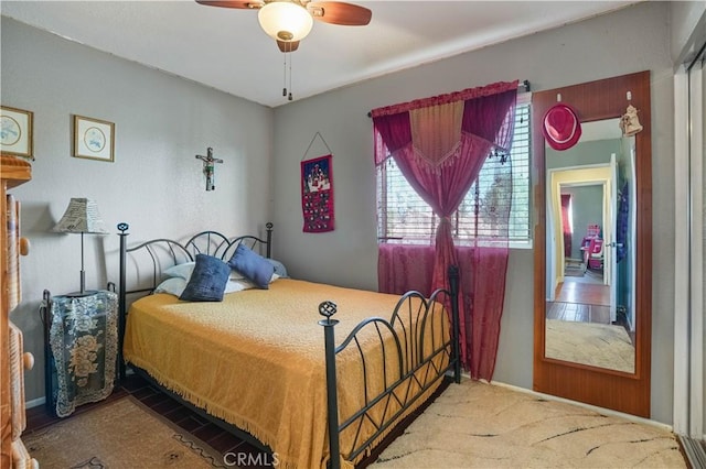 bedroom featuring carpet flooring and ceiling fan