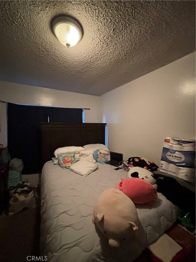 bedroom with a textured ceiling