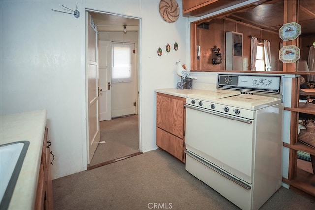 kitchen featuring white stove