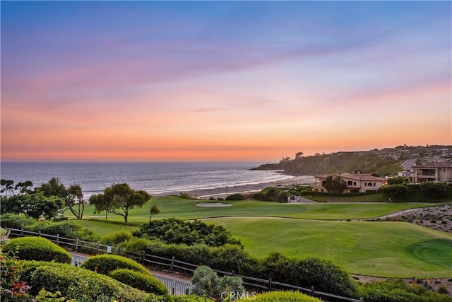 surrounding community featuring a water view