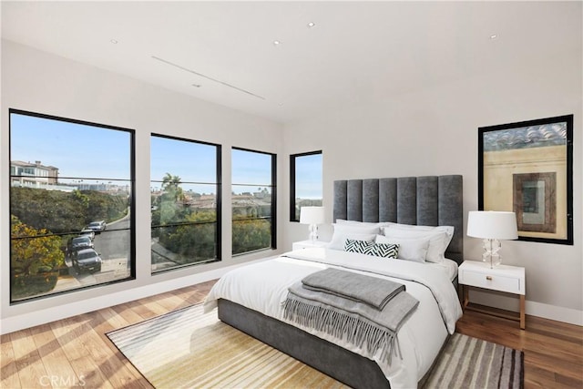 bedroom with wood-type flooring