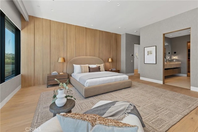 13 Ritz Cove Dr, Dana Point, CA 92629 - bedroom with wood finished floors, baseboards, and wooden walls