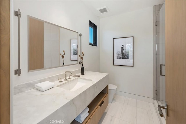13 Ritz Cove Dr, Dana Point, CA 92629 - full bath featuring toilet, a shower stall, vanity, and baseboards