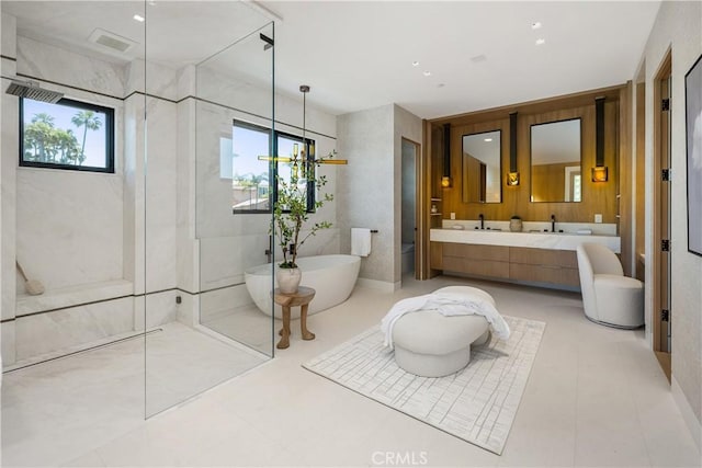 13 Ritz Cove Dr, Dana Point, CA 92629 - full bathroom with a freestanding tub, an enclosed shower, and double vanity