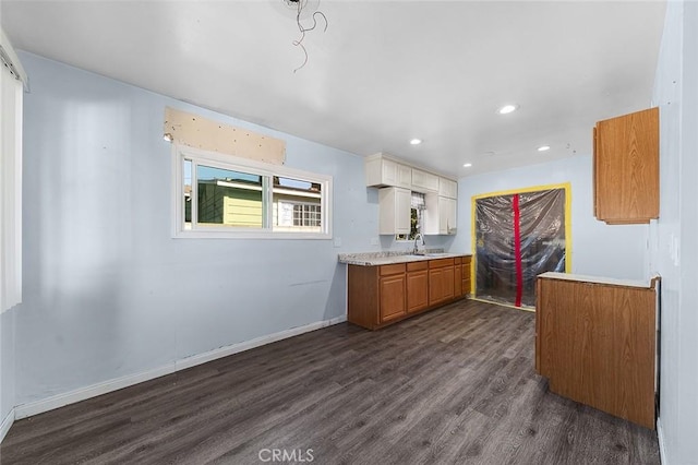 kitchen with dark hardwood / wood-style floors