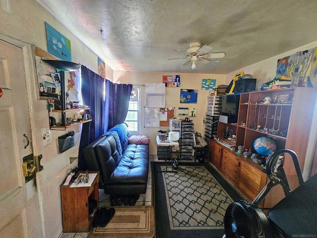 living room featuring ceiling fan