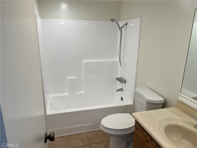 full bathroom with shower / bathing tub combination, tile patterned flooring, vanity, and toilet