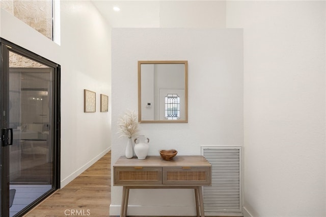 hallway featuring light wood-type flooring