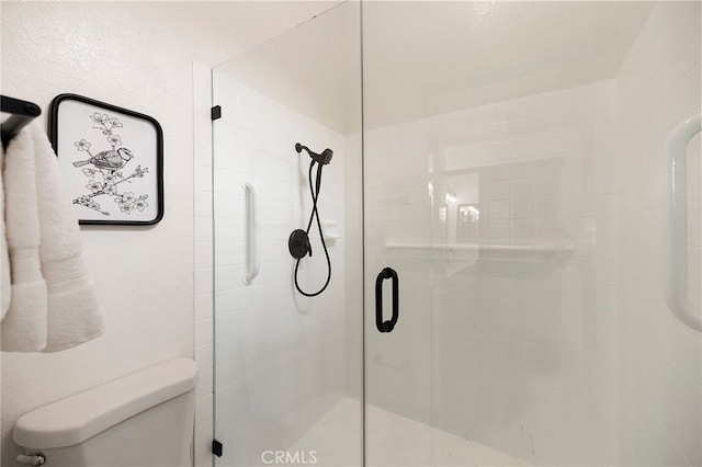 77640 Woodhaven Dr N, Palm Desert, CA 92211 - bathroom featuring a stall shower and toilet