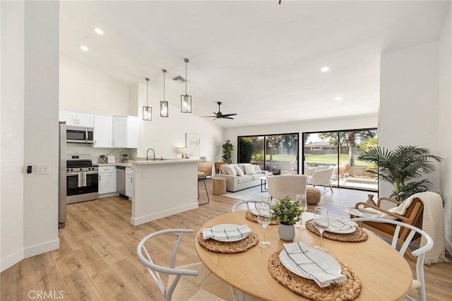 77640 Woodhaven Dr N, Palm Desert, CA 92211 - dining room featuring ceiling fan, light wood-style floors, recessed lighting, and high vaulted ceiling