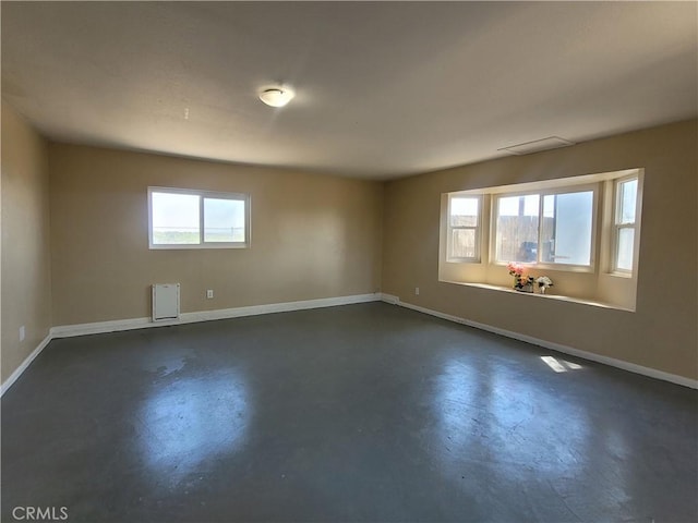 empty room featuring radiator heating unit