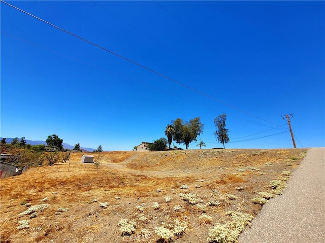 view of road with a rural view