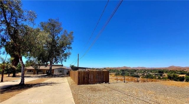 exterior space featuring a mountain view