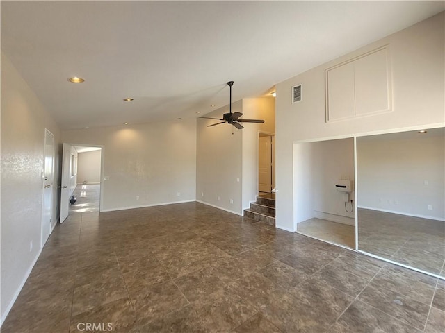 unfurnished room featuring ceiling fan and high vaulted ceiling