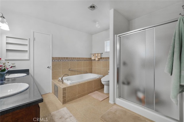 full bathroom with vanity, shower with separate bathtub, tile patterned flooring, and toilet