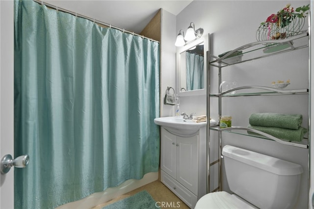 full bathroom featuring tile patterned flooring, vanity, toilet, and shower / bath combination with curtain