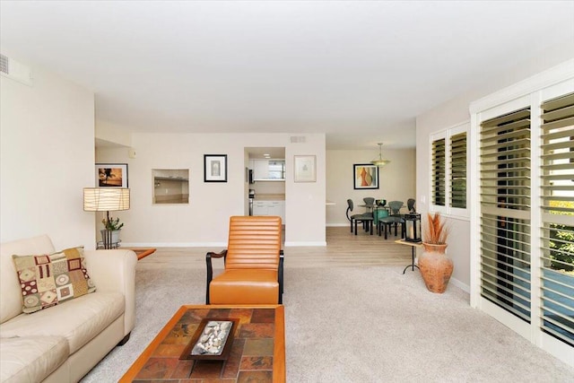 living room featuring carpet flooring