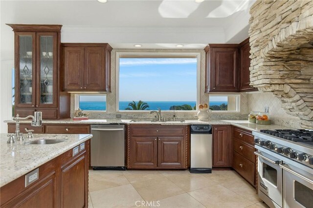 19 Marguerite Dr, Rancho Palos Verdes, CA 90275 - kitchen with a sink, appliances with stainless steel finishes, decorative backsplash, light stone countertops, and crown molding