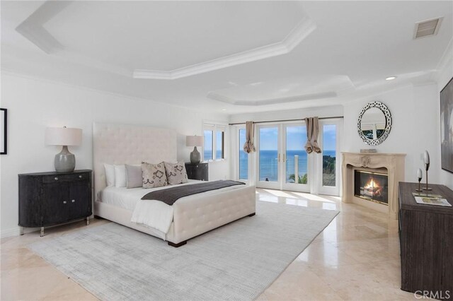 19 Marguerite Dr, Rancho Palos Verdes, CA 90275 - bedroom with a raised ceiling, access to outside, a fireplace, a water view, and crown molding