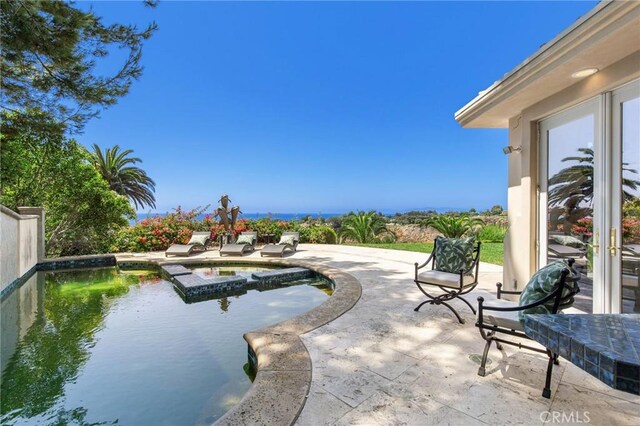 19 Marguerite Dr, Rancho Palos Verdes, CA 90275 - view of swimming pool with a patio and a pool with connected hot tub