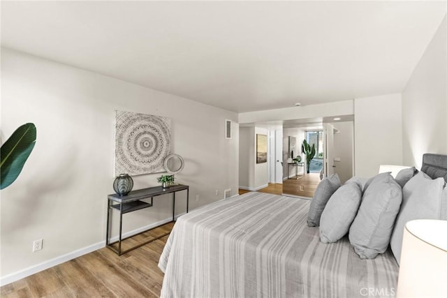 bedroom featuring light hardwood / wood-style flooring