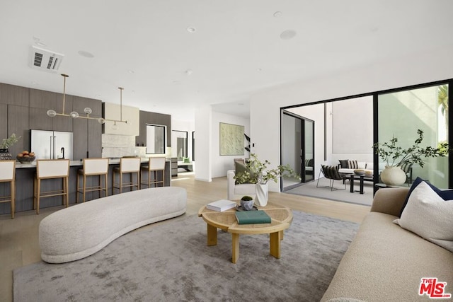 living room featuring light wood-type flooring