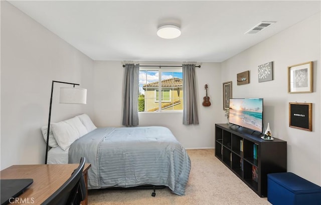 bedroom featuring carpet