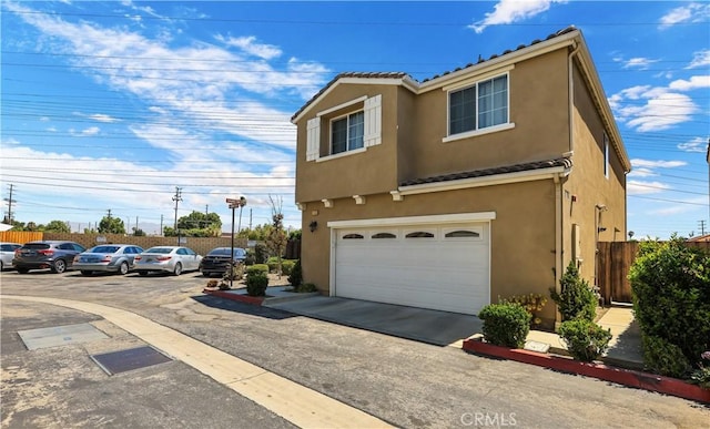 view of front of home featuring a garage