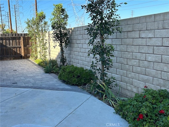 view of side of home featuring a patio area