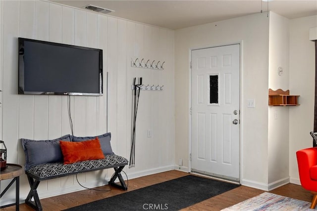 entrance foyer with dark hardwood / wood-style floors