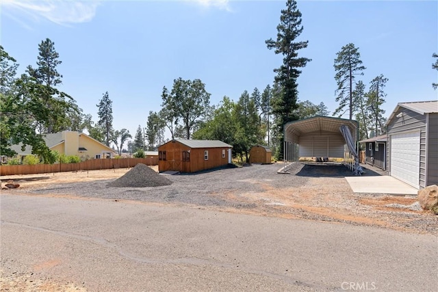 view of front of home featuring a carport