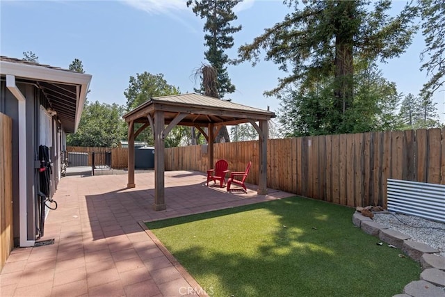 view of yard featuring a gazebo and a patio