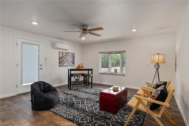 living room featuring an AC wall unit, ceiling fan, and dark hardwood / wood-style flooring