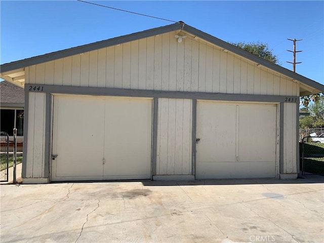 detached garage with fence