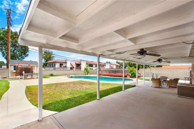 view of patio / terrace featuring a fenced in pool