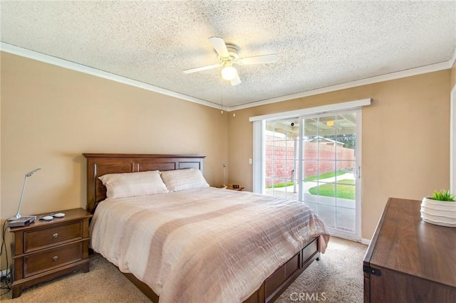 carpeted bedroom featuring access to outside, ceiling fan, crown molding, and a textured ceiling