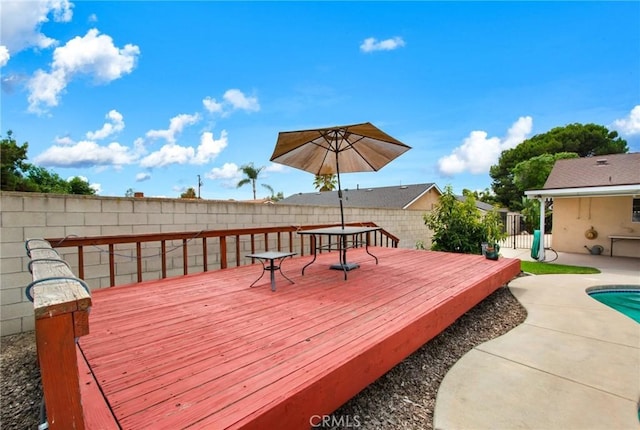 deck with a pool