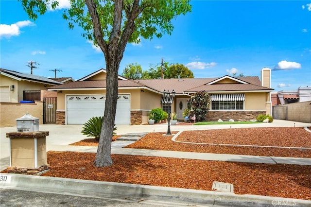 ranch-style home featuring a garage