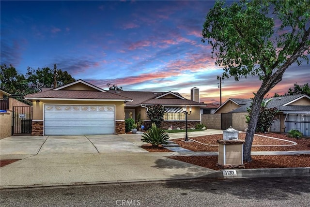 view of front of property with a garage