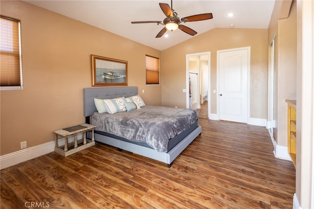 bedroom featuring lofted ceiling, dark hardwood / wood-style floors, and ceiling fan