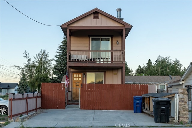 view of front of home with a balcony