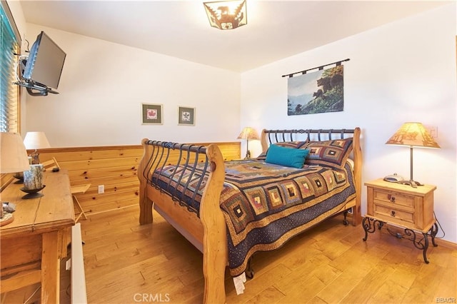 bedroom featuring light wood-type flooring